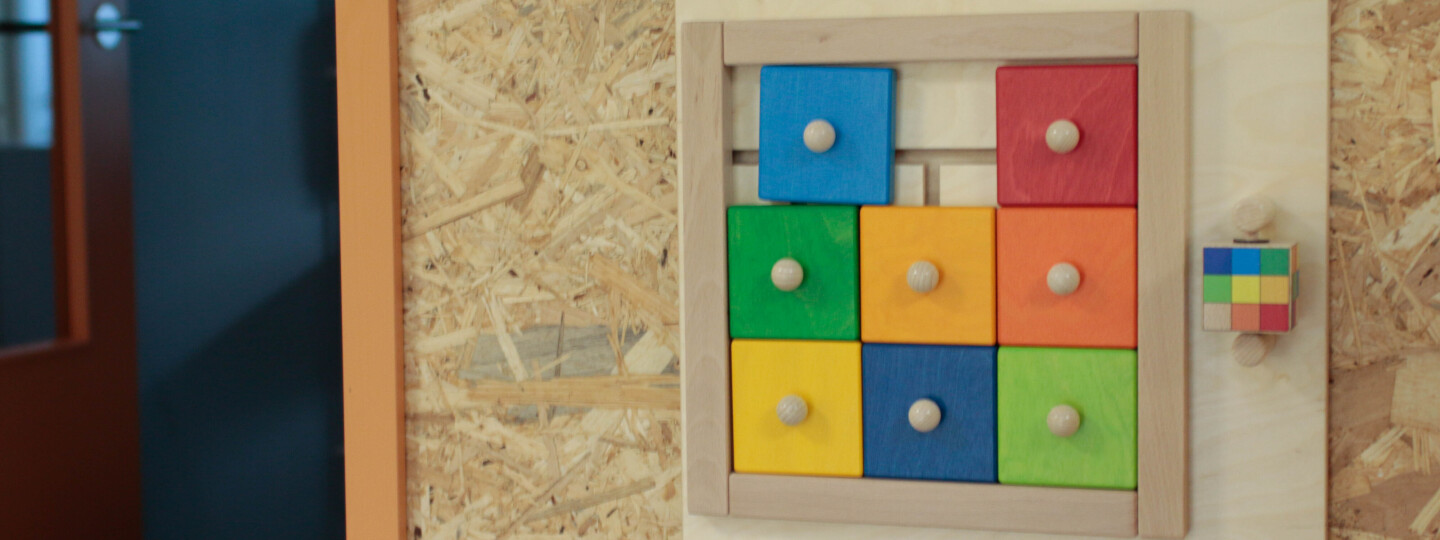 a wooden game with squares