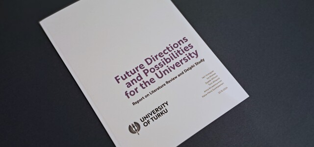 Printed version of the Future Directions and Possibilities for the University report with a white cover.