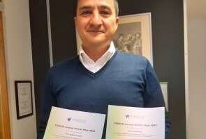 Ulvi Gursoy ja FINDOS Journal Article Awards- diplomit