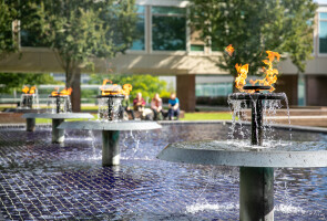 Fountain with fires on university hill