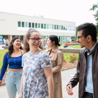 four students walking together